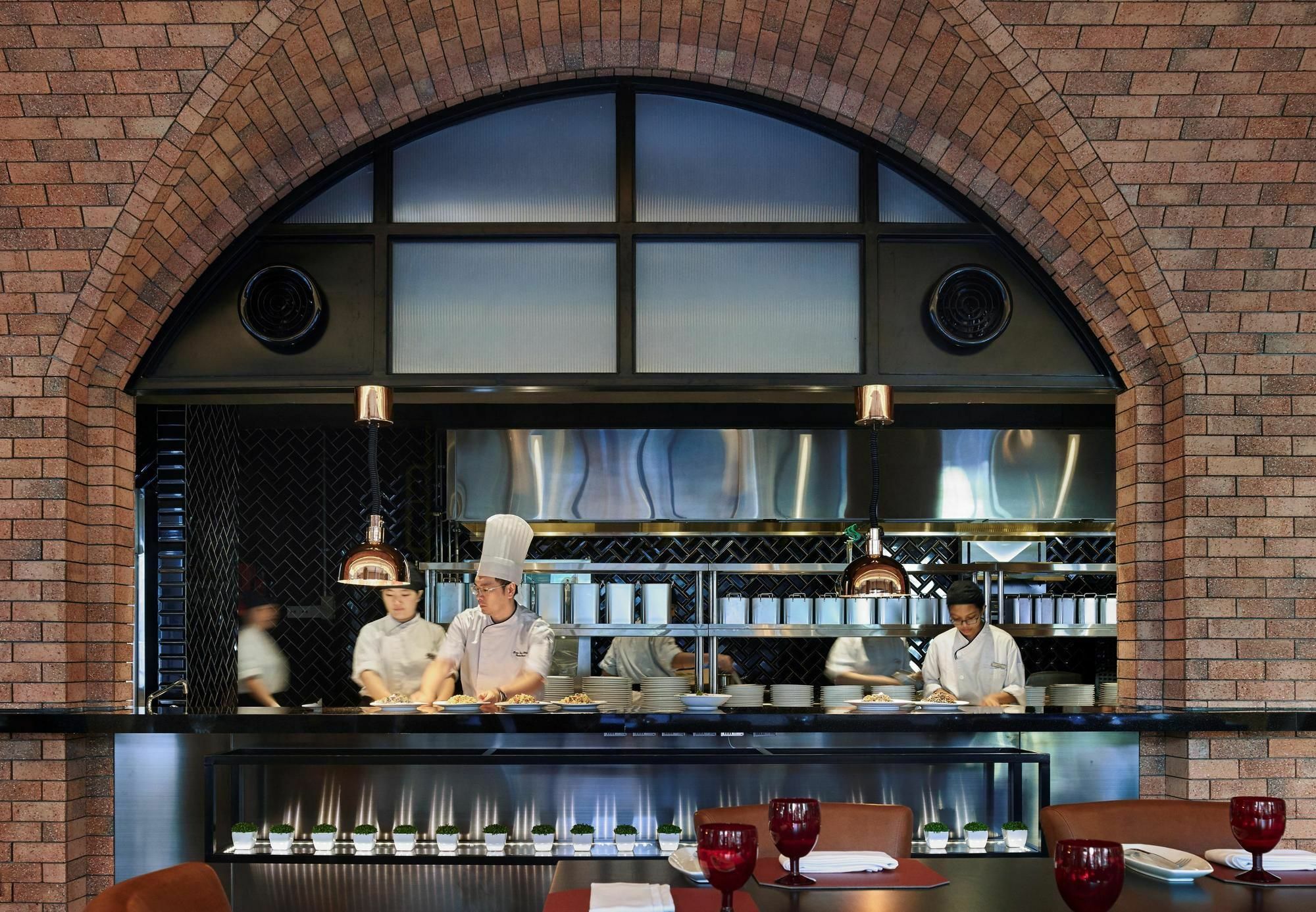 Hotel Stripes Kuala Lumpur, Autograph Collection Kültér fotó The open kitchen at the restaurant